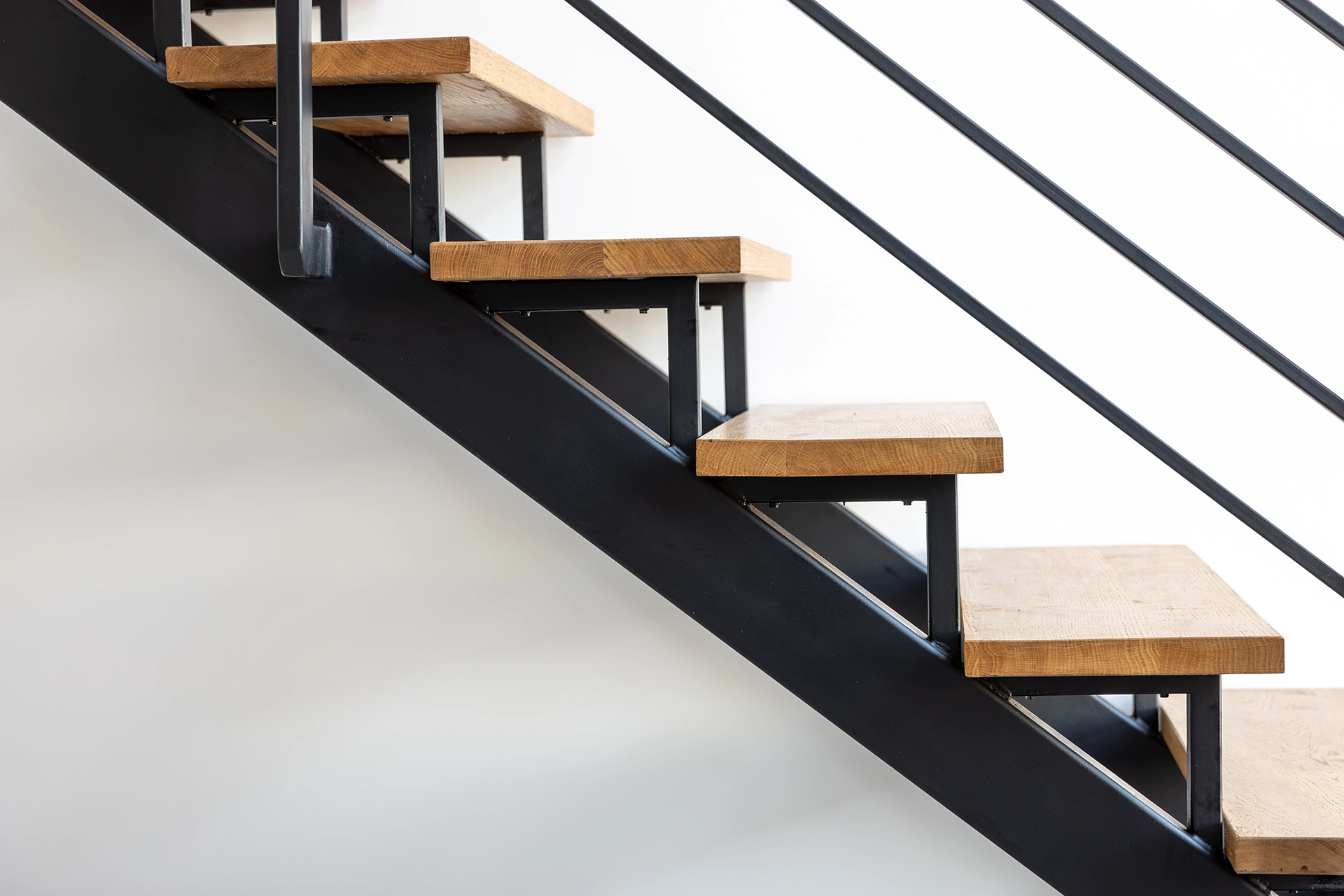 ©FreePik step detail closeup wood black steel industrial interior